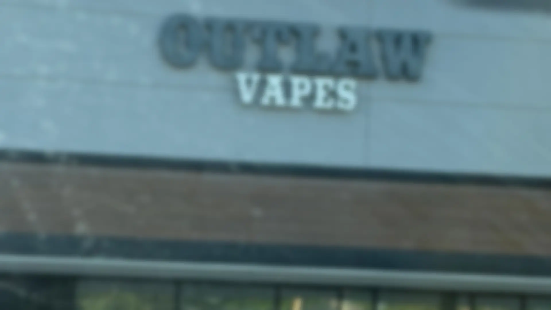 Outlaw Vapes storefront at 7156 Atascocita Rd in Humble, TX